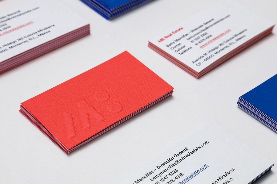 Bold colored card Embossed logo on bold colored business card back