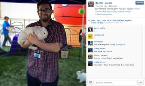 a man holding a stuffed animal in his arms.